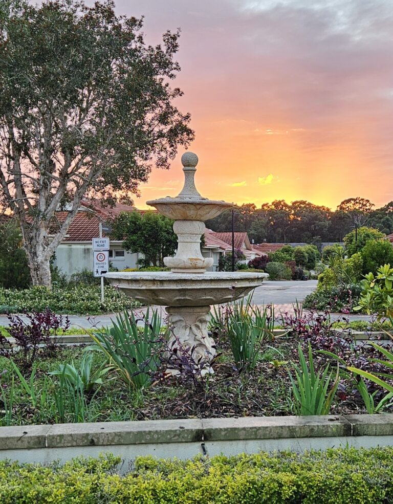 Picture showing centre fountain against sunrise